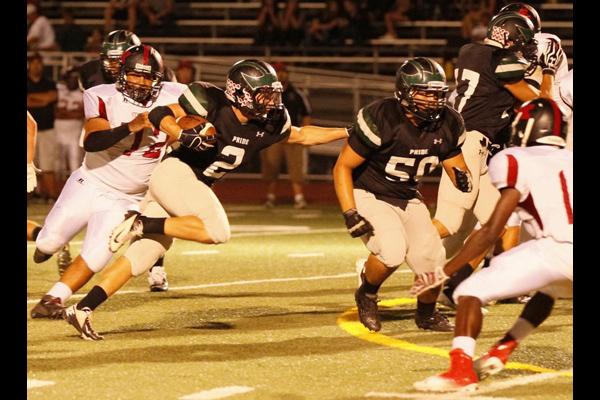 Pride Football Players Work to Develop Strength, Endurance, Power and Discipline