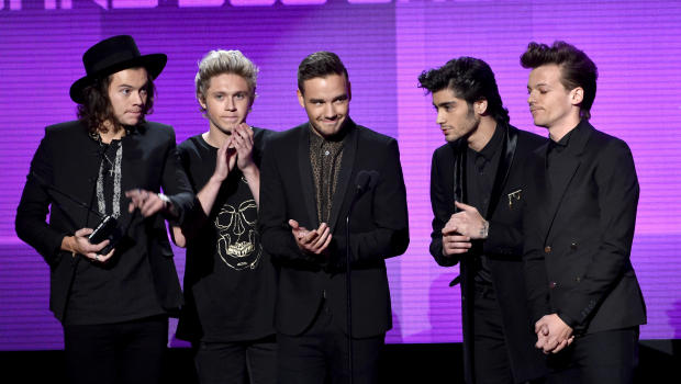 LOS ANGELES, CA - NOVEMBER 23:  (L-R) Recording artists Harry Styles, Niall Horan, Liam Payne, Zayn Malik and Louis Tomlinson of One Direction accept the Favorite Pop/Rock Band/Duo/Group award onstage at the 2014 American Music Awards at Nokia Theatre L.A. Live on November 23, 2014 in Los Angeles, California.  (Photo by Kevin Winter/Getty Images)