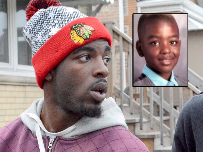 Pierre Stokes,  Tyshawn Lees father looks to ask the Police some questions near the scene at 81st & Damen. Thursday, November 5, 2015. Brian Jackson/ For the Chicago Sun-Times