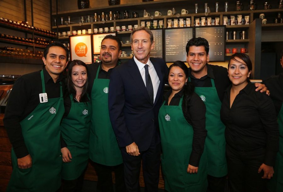 MEXICO CITY, MEXICO - OCTOBER 15:  Starbucks CEO Howard Schultz (C) and staff pose to photographers during the Starbucks Mexico 10th anniversary and opening of the new Starbucks store Bosque De Chapultepec store at Av. Paseo De La Reforma on October 15, 2012 in Mexico City, Mexico.  (Photo by Victor Chavez/WireImage)