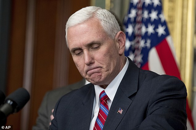 Vice President Mike Pence pauses while speaking before administering the oath of office to Energy Secretary Rick Perry, left, Thursday, March 2, 2017, in the Eisenhower Executive Office Building on the White House complex in Washington. (AP Photo/Andrew Harnik)