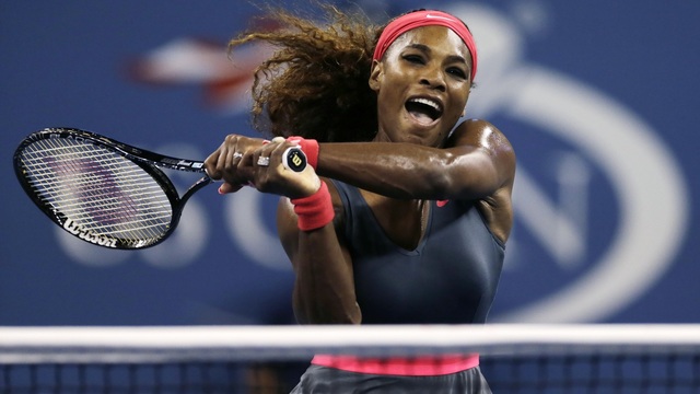 Serena Williams, of the United States, yells as she charges the net for a return against Yaroslava Shvedova, of Kazakhstan, during the third round of the 2013 U.S. Open tennis tournament, Saturday, Aug. 31, 2013, in New York. (AP Photo/Charles Krupa)